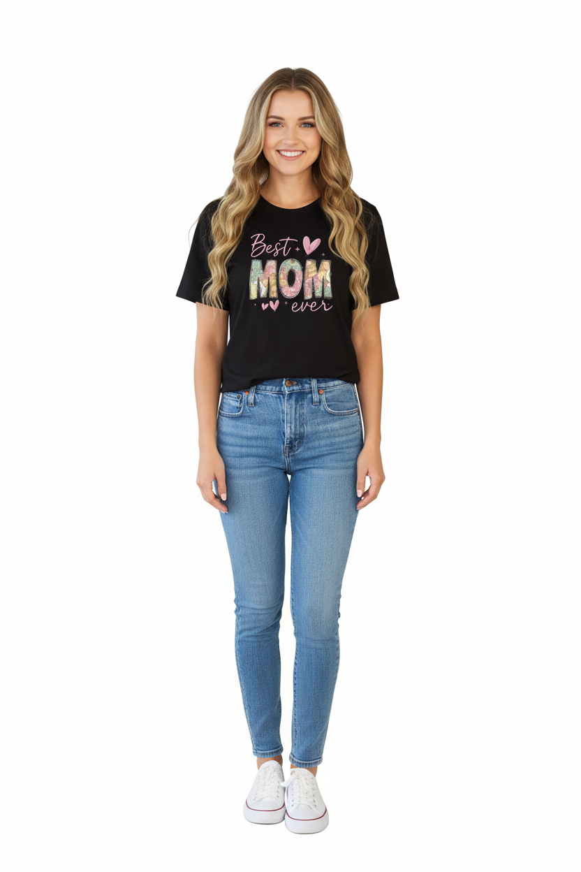 Black t-shirt with 'Best Mom ever' text worn by a person with long blonde hair.